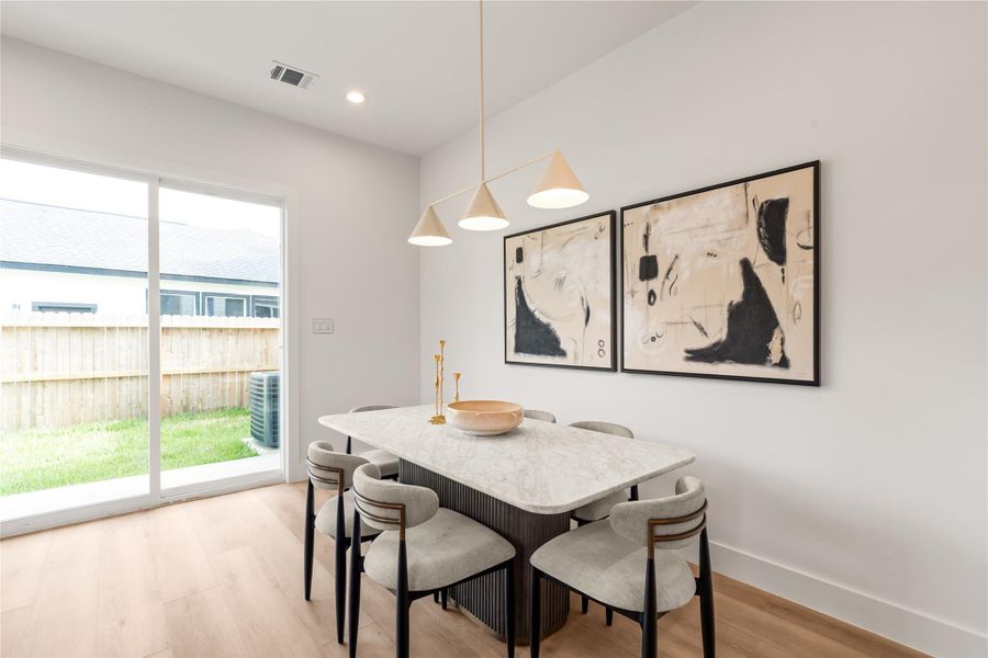 There's a warmth to this room that goes beyond the finishes — it's the kind of space where people naturally linger a little longer after the meal is over. It's built for connection.