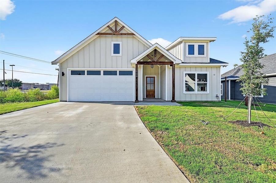 Front exterior of a new home in , Sherman, TX, highlighting curb appeal (Image 19).
