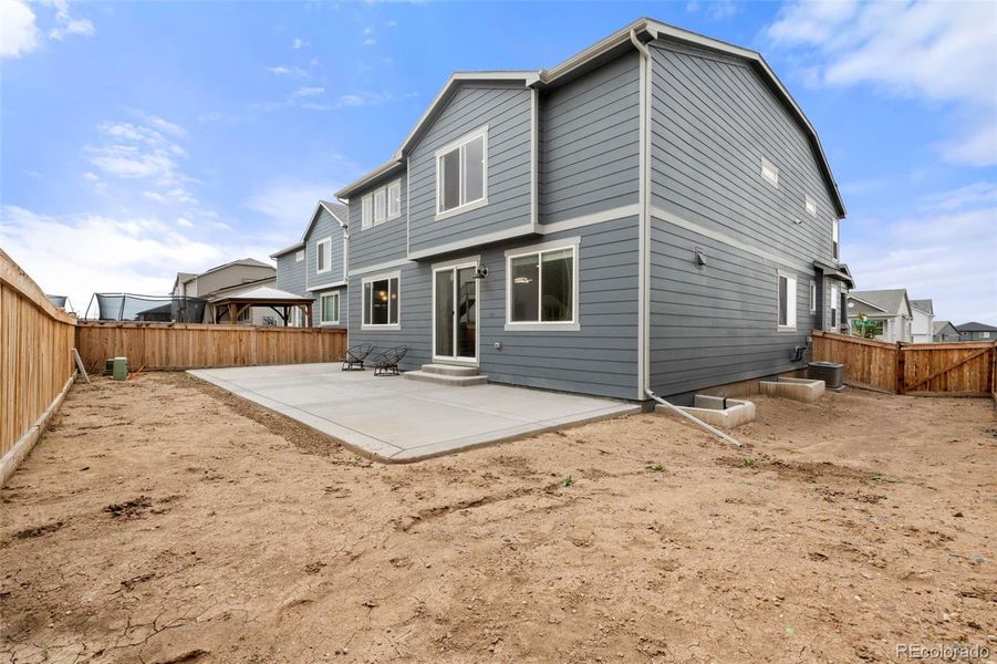 Front exterior of a new home in Buffalo Highlands: The Canyon Collection, Commerce City, CO, highlighting curb appeal (Image 19).