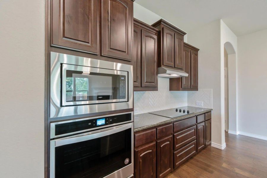 Kitchen | Concept 2671 at Mockingbird Hills in Joshua, TX by Landsea Homes