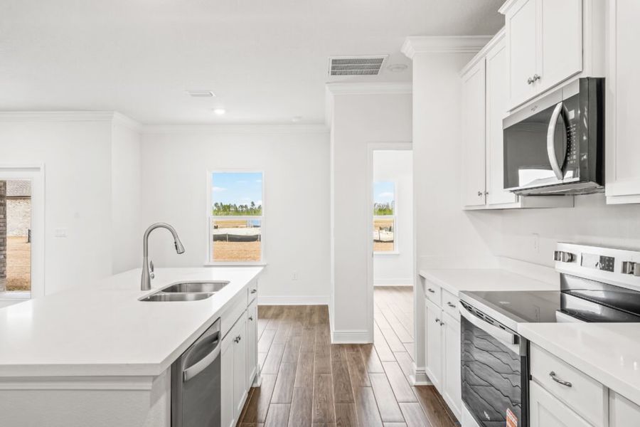 Furnished interior view inside a new home in Natureview, Freeport (Image 6).