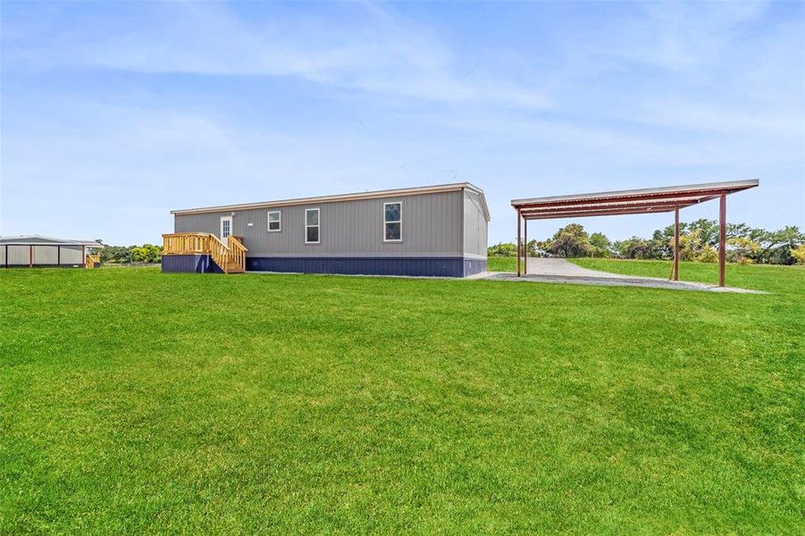 Exterior details and patio area of a home in , Poolville (Image 24). Exterior details and patio area of a home in , Poolville (Image 24).