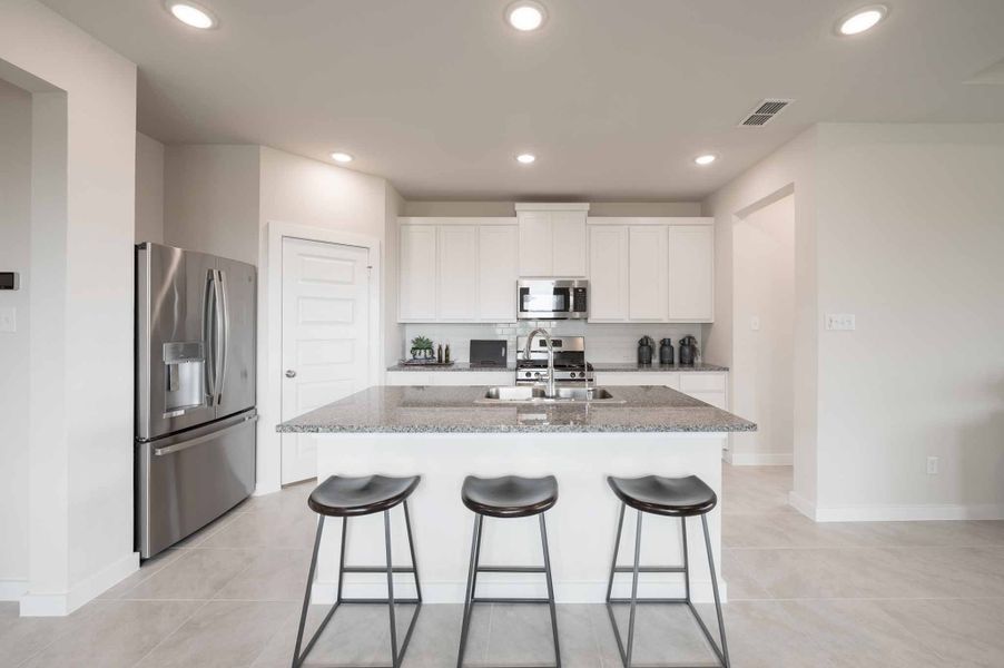 Furnished interior view inside a new home in The Cove at Mason Woods, Cypress (Image 8). Furnished interior view inside a new home in The Cove at Mason Woods, Cypress (Image 8).