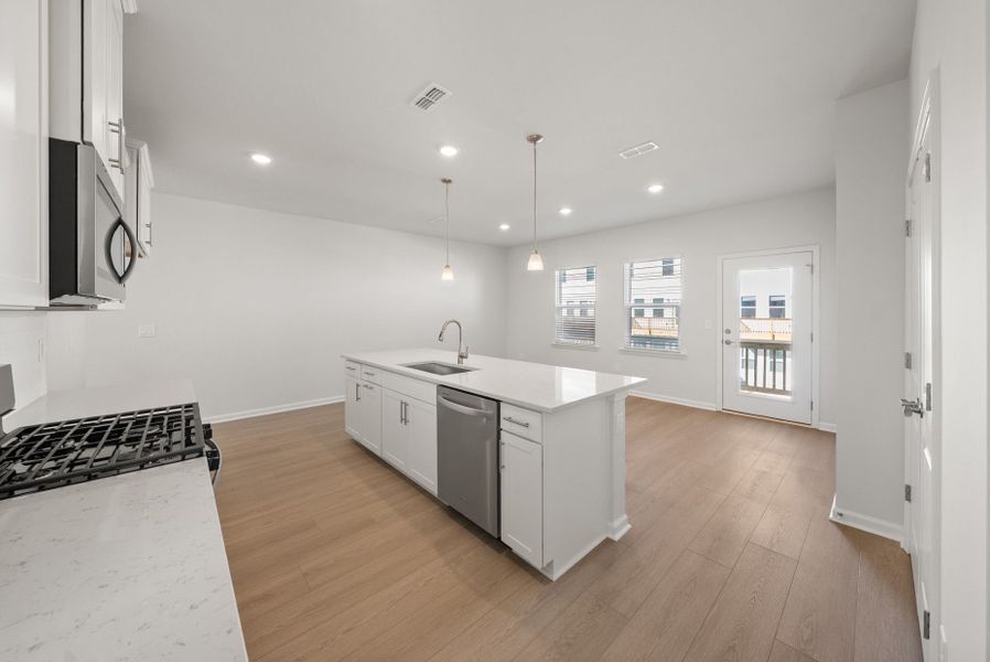 Furnished interior view inside a new home in Huxley, Apex (Image 8).
