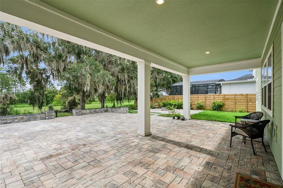 Exterior details and patio area of a home in Weslyn Park at Sunbridge, St. Cloud (Image 27).