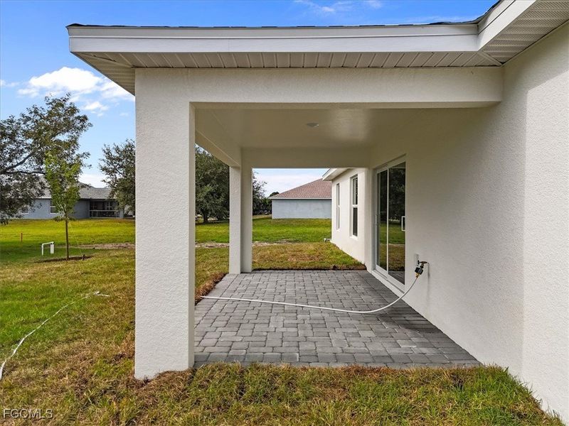 Exterior details and patio area of a home in Cape Coral, Cape Coral (Image 3).