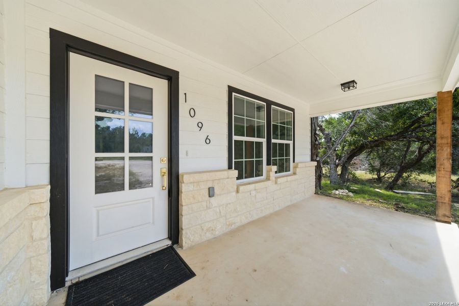 Exterior details and patio area of a home in , Spring Branch (Image 2). Exterior details and patio area of a home in , Spring Branch (Image 2).