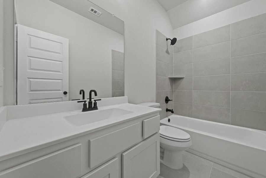 Furnished interior view inside a new home in The Trails, New Caney (Image 9).