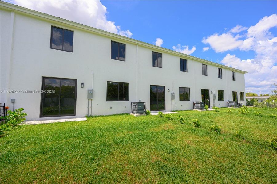 Front exterior of a new home in , Florida City, FL, highlighting curb appeal (Image 18).