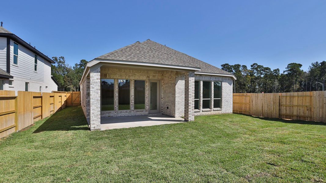 Exterior details and patio area of a home in Grand Central Park 45', Conroe (Image 3). Exterior details and patio area of a home in Grand Central Park 45', Conroe (Image 3).