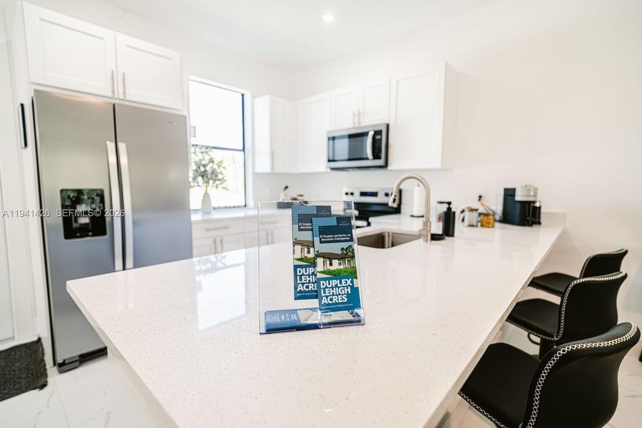 Furnished interior view inside a new home in , Lehigh Acres (Image 18).