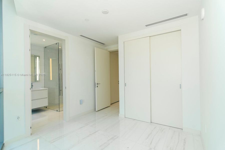 Spacious, unfurnished interior of a new home in Aston Martin Residences, Miami (Image 20).