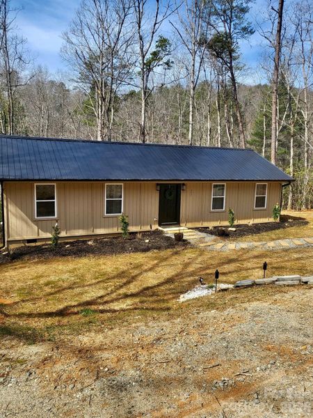 Exterior details and patio area of a home in , Lake Lure (Image 20).