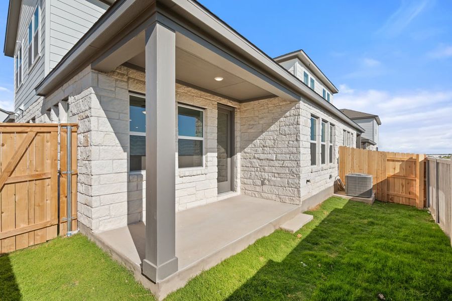 Exterior details and patio area of a home in Union Collection at Park Central, Georgetown (Image 26).