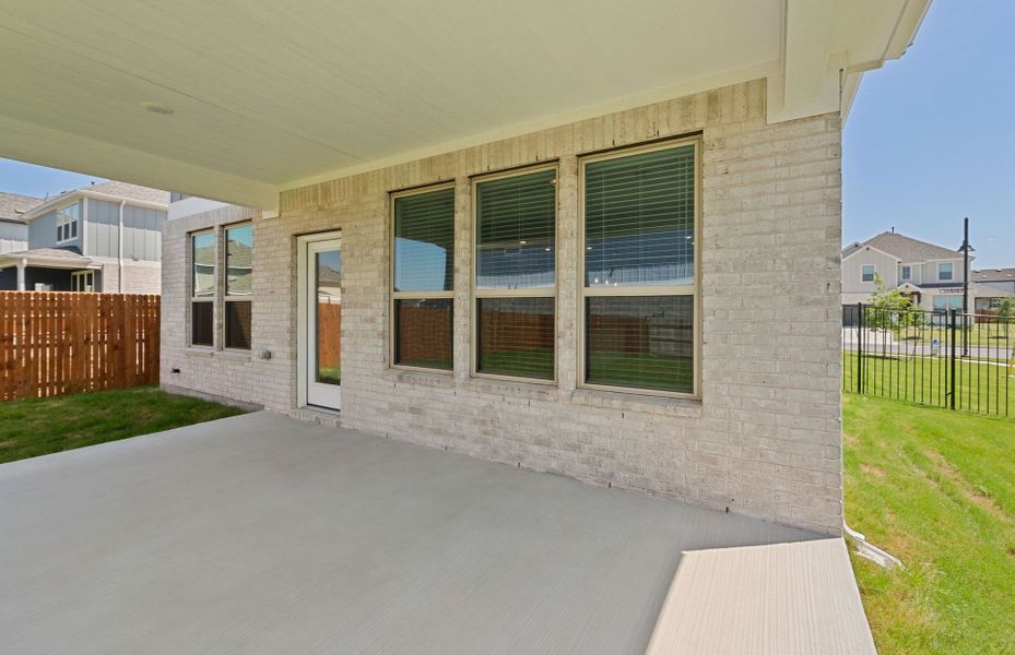 Exterior details and patio area of a home in Santa Rita Ranch, Liberty Hill (Image 28).