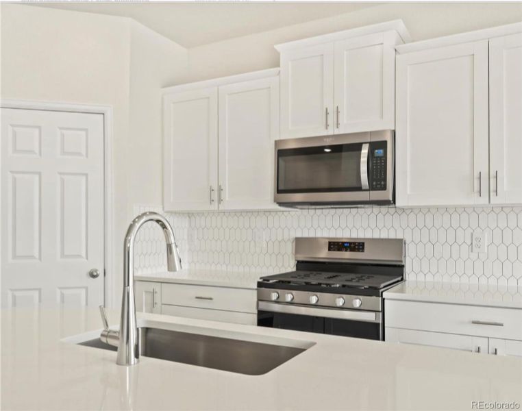 Furnished interior view inside a new home in Buffalo Highlands: The Flora Collection, Commerce City (Image 7).