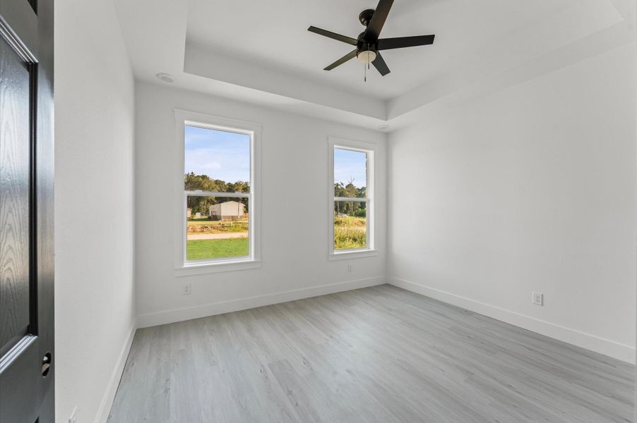 Spacious secondary bedrooms. Photos are representative of the same floor plan built by this builder. Finishes will be the same or similar.