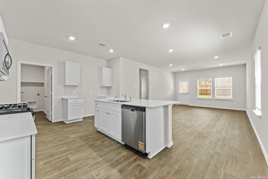 Furnished interior view inside a new home in Hunters Ranch, San Antonio (Image 7).