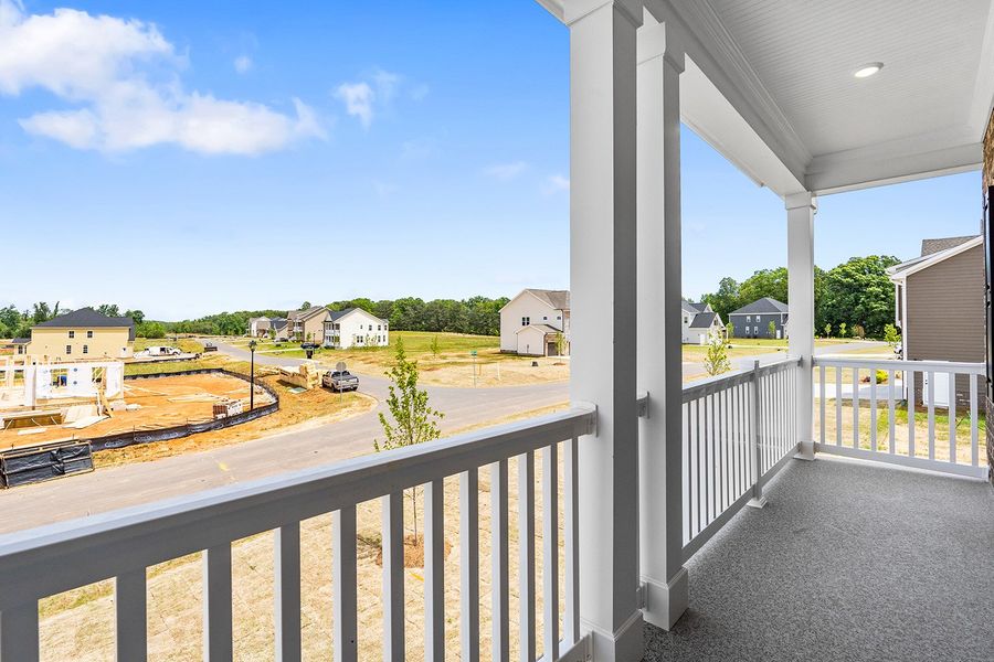 Exterior details and patio area of a home in Lilah Grove, Summerfield (Image 3).
