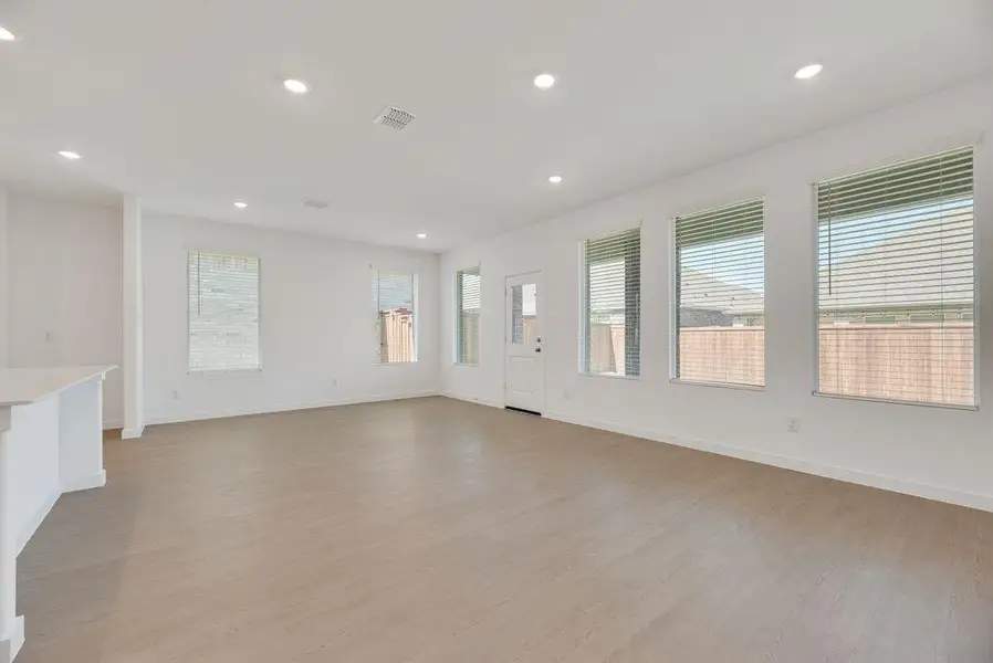 Spare room with recessed lighting and light wood-style flooring