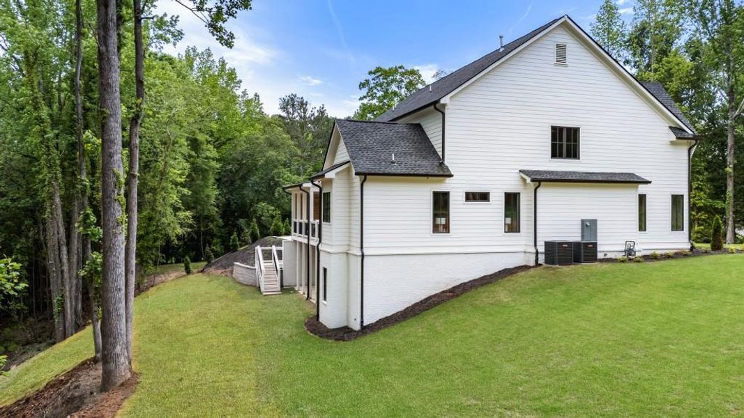 Front exterior of a new home in , Milton, GA, highlighting curb appeal (Image 26).