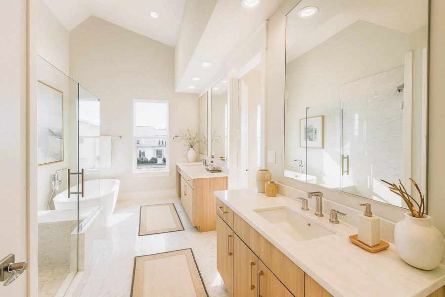 Spa- Like Bathroom w/ Seated Shower, Free Standing Tub, Split Vanities and Hans Grohe Plumbing Fixtures Spa- Like Bathroom w/ Seated Shower, Free Standing Tub, Split Vanities and Hans Grohe Plumbing Fixtures