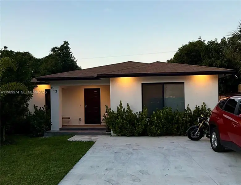 Front exterior of a new home in , Delray Beach, FL, highlighting curb appeal (Image 1). Front exterior of a new home in , Delray Beach, FL, highlighting curb appeal (Image 1).