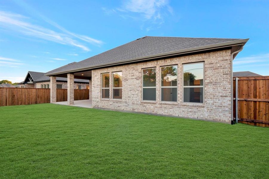 Exterior details and patio area of a home in Sterling Greene, Arlington (Image 3).