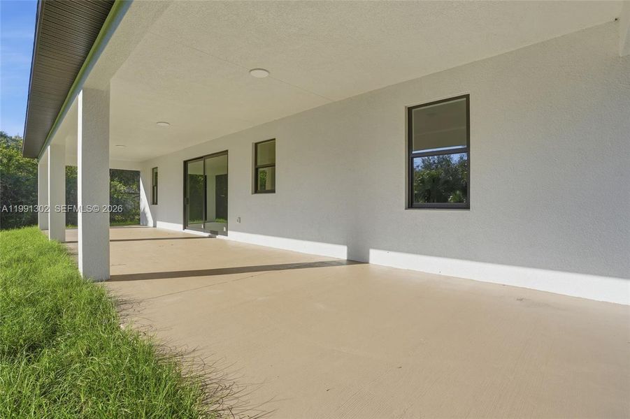 Exterior details and patio area of a home in , Labelle (Image 3).