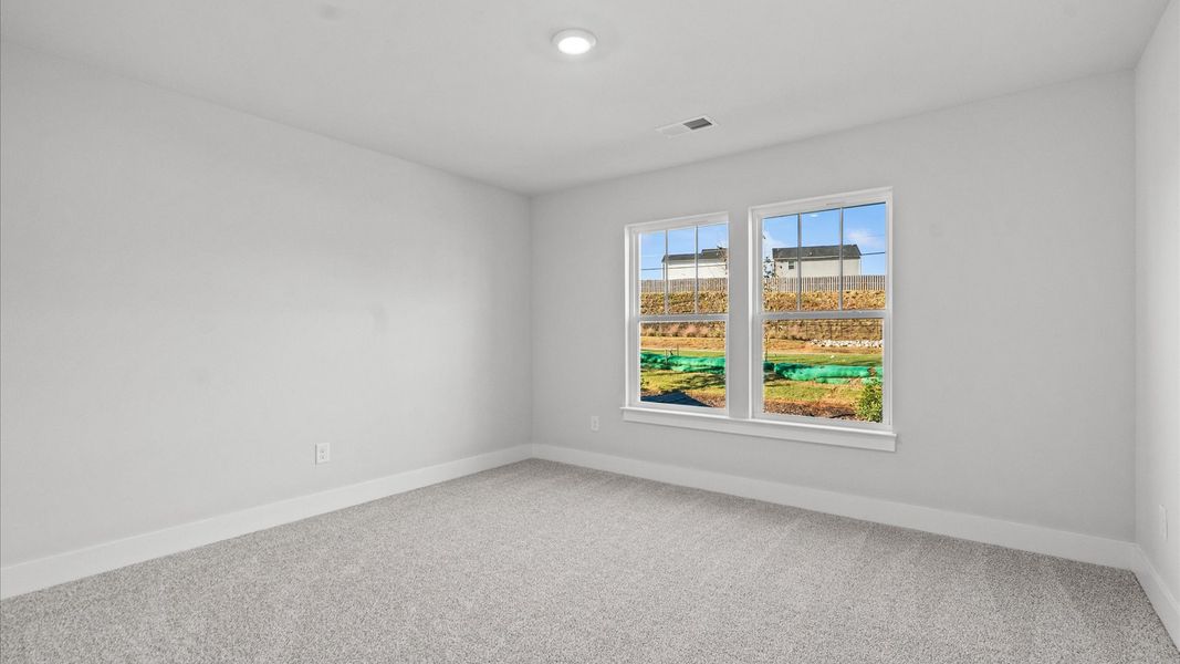 Furnished interior view inside a new home in Camden Cottages, Greenville (Image 24).