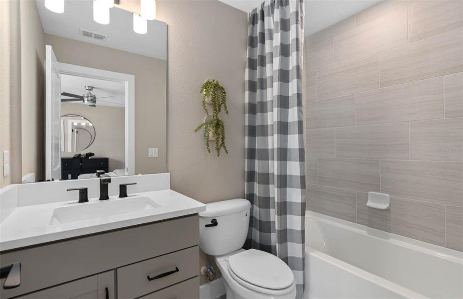 Furnished interior view inside a new home in Sunrise Estates, West Melbourne (Image 17).
