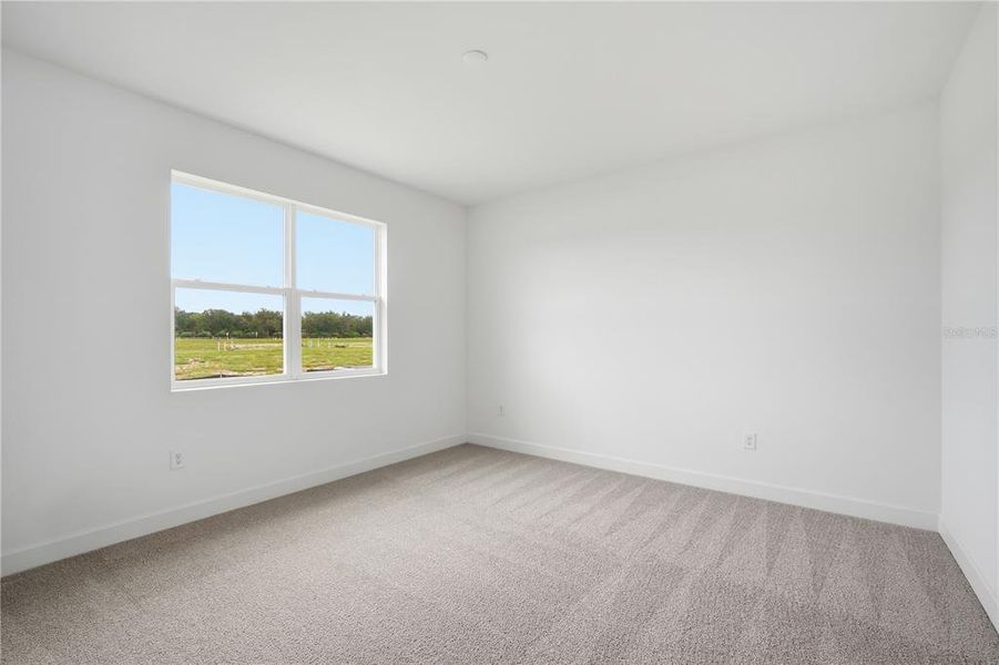 Spacious, unfurnished interior of a new home in Estates at Rivers Edge, Parrish (Image 25).