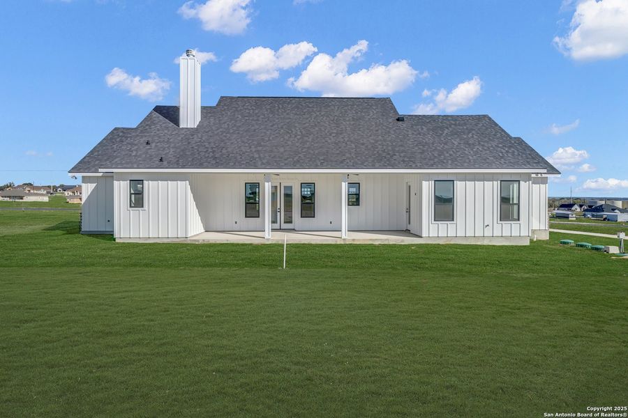 Exterior details and patio area of a home in , La Vernia (Image 33).