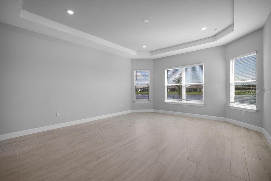 Spacious, unfurnished interior of a new home in Esplanade at Skye Ranch, Sarasota (Image 21).