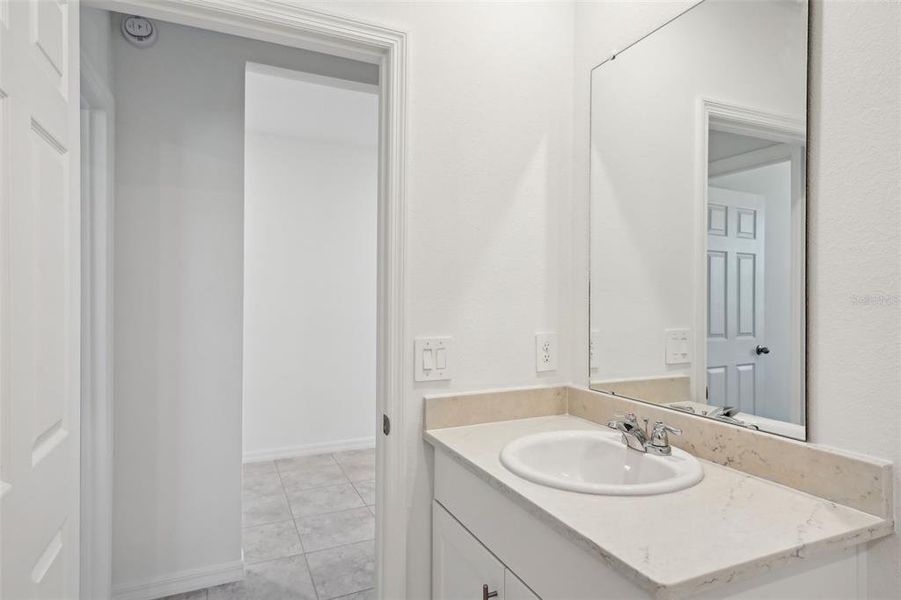 Furnished interior view inside a new home in Lake Deer Estates - Signature Series, Poinciana (Image 15). Furnished interior view inside a new home in Lake Deer Estates - Signature Series, Poinciana (Image 15).