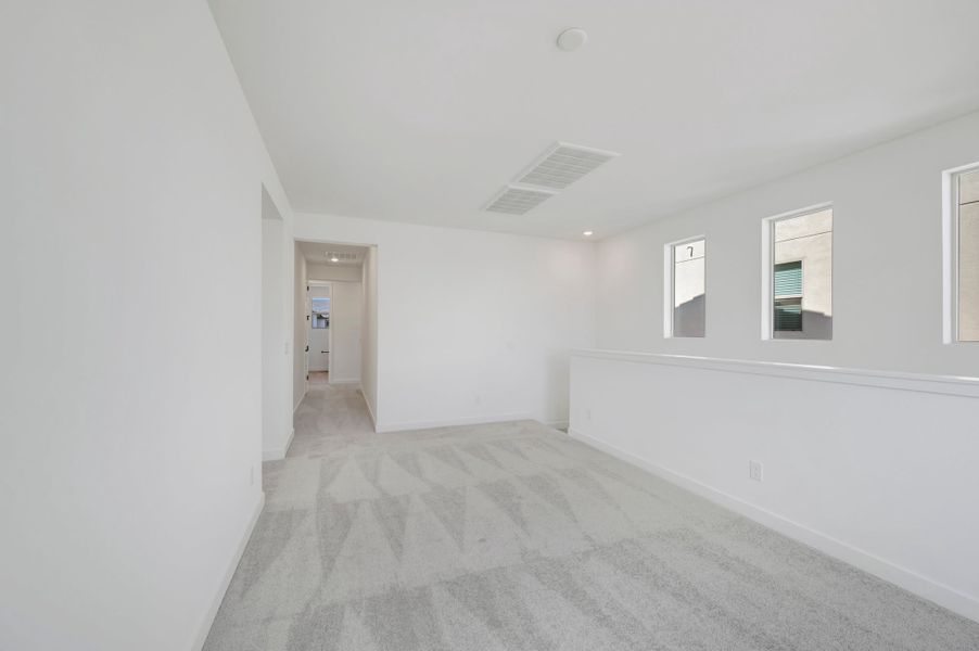 Spacious, unfurnished interior of a new home in Soleo, San Tan Valley (Image 27).