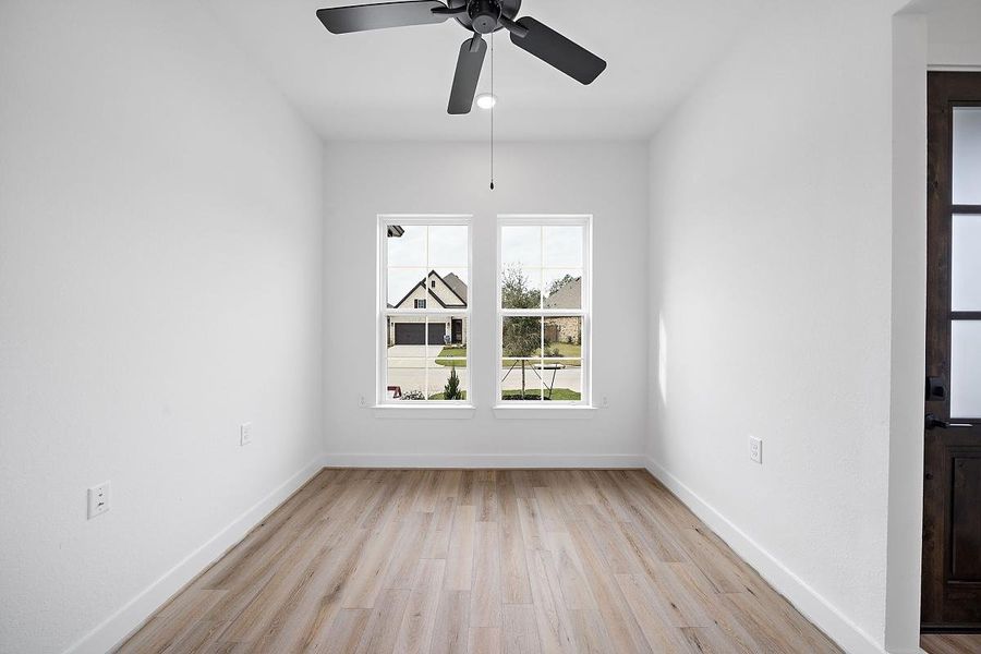 Representative unfurnished interior of a home built from the Cardinal by Caldwell Homes in Chambers Creek, Willis (Image 16).
