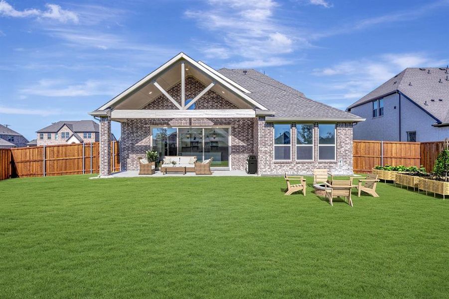 Exterior details and patio area of a home in Kreymer at the Park, Wylie (Image 26).