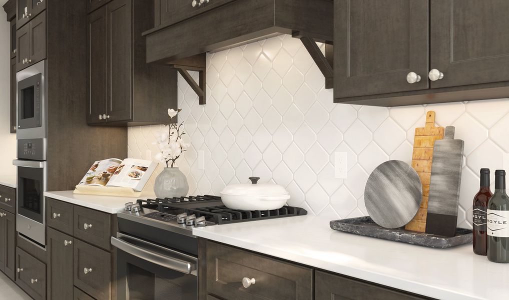 Hexagonal backsplash and stainless steel appliances