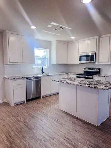 Furnished interior view inside a new home in , Springtown (Image 4). Furnished interior view inside a new home in , Springtown (Image 4).