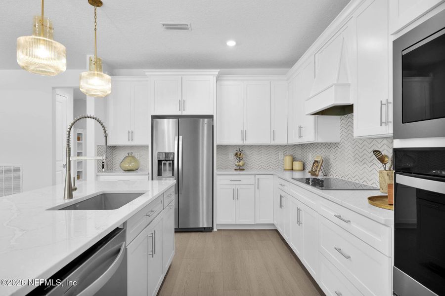 Furnished interior view inside a new home in Hyland Trail, Green Cove Springs (Image 9).