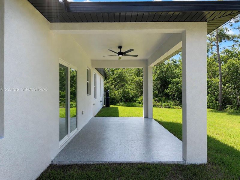 Exterior details and patio area of a home in , Sebring (Image 30).