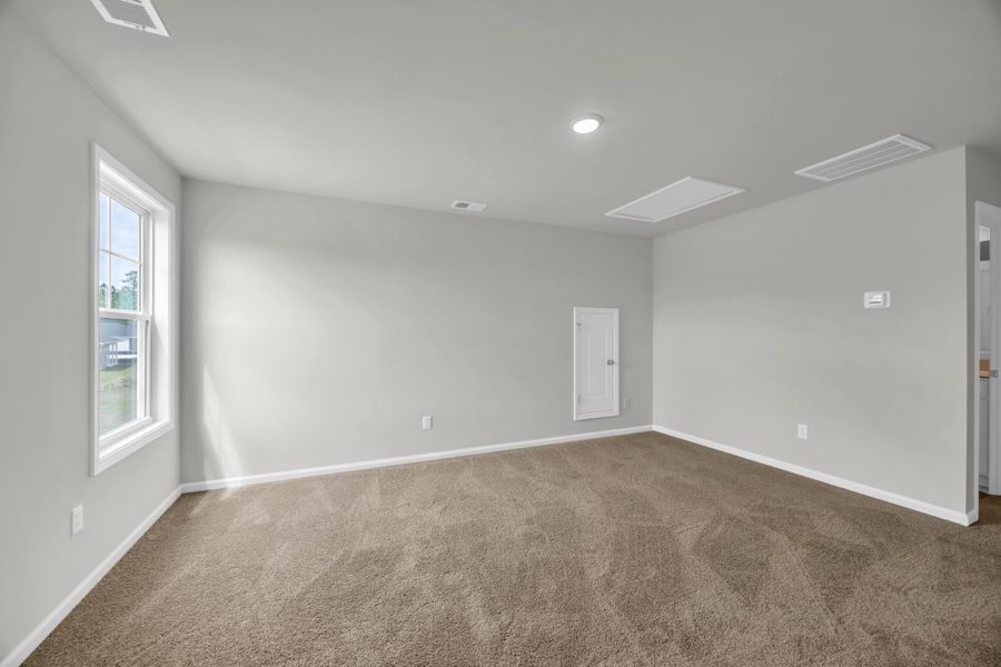 Unfurnished room with carpet flooring and recessed lighting