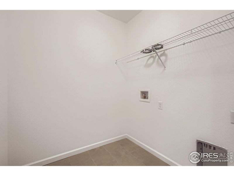 Conveniently placed laundry room right between the two bedrooms (3rd level)
