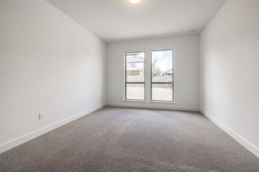 Wonderful second bedroom on first floor for family & friends