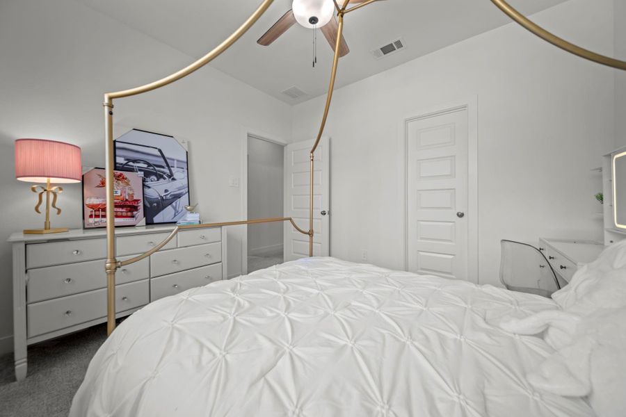 Another view of the bedroom highlights its generous size, neutral palette, and closet storage. Another view of the bedroom highlights its generous size, neutral palette, and closet storage.