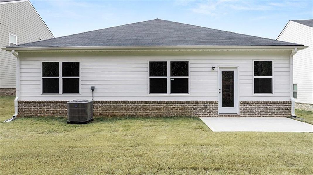 Exterior details and patio area of a home in The Reserve at Calcutta, Stockbridge (Image 3).