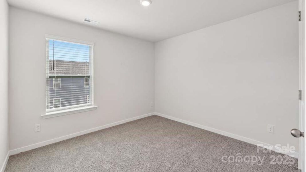 Spacious, unfurnished interior of a new home in Cardinal Creek, Charlotte (Image 27).