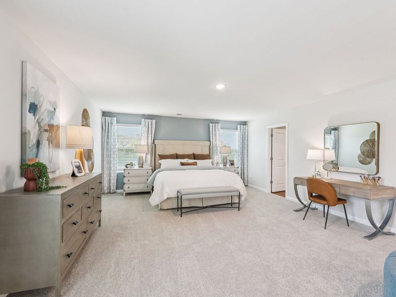 Primary bedroom in the Taylorsville floorplan at a Meritage Homes community in Mebane, NC. Primary bedroom in the Taylorsville floorplan at a Meritage Homes community in Mebane, NC.