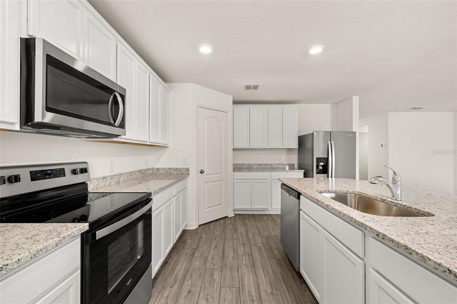 Furnished interior view inside a new home in , Poinciana (Image 11). Furnished interior view inside a new home in , Poinciana (Image 11).